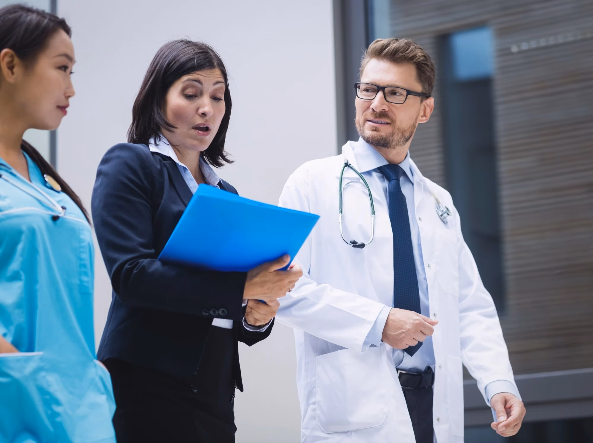 Financial advisor consulting with medical practice owner about money strategy