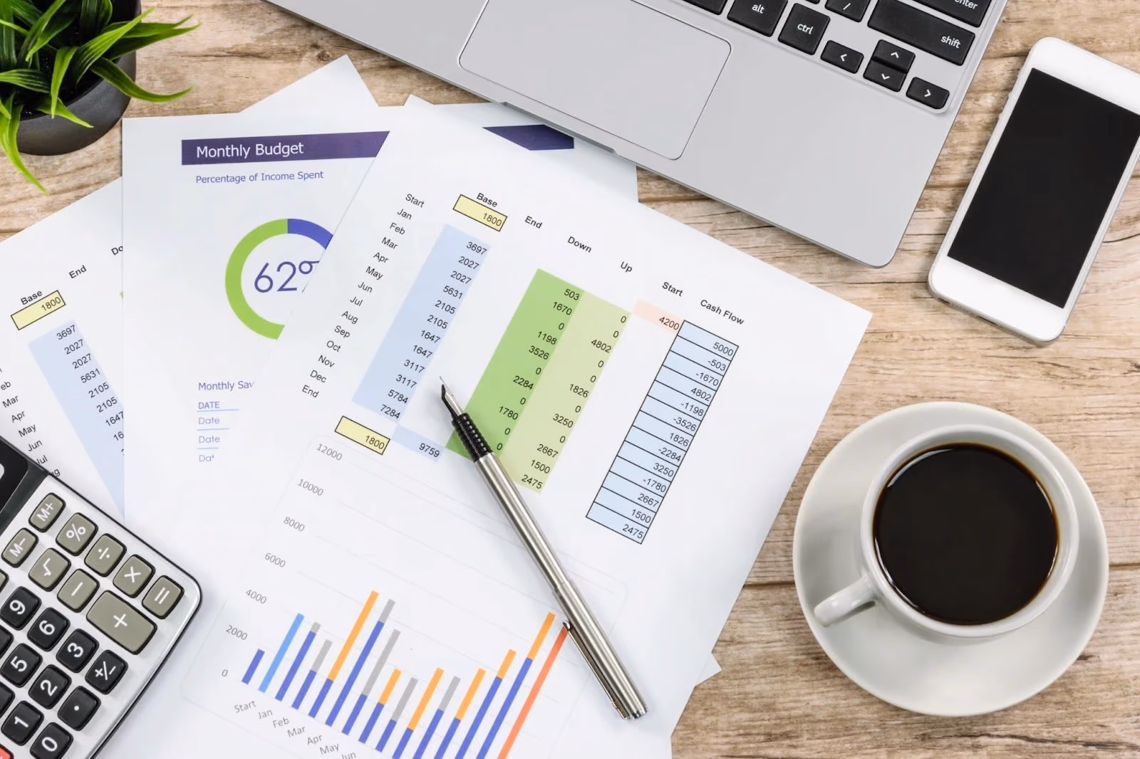 Tax preparation receipts, calculator, and forms organized for small business filing