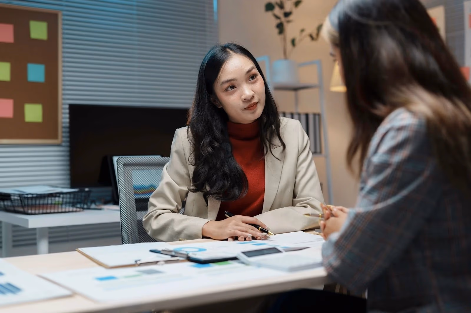 Female entrepreneur meeting with experienced financial advisor to discuss strategy
