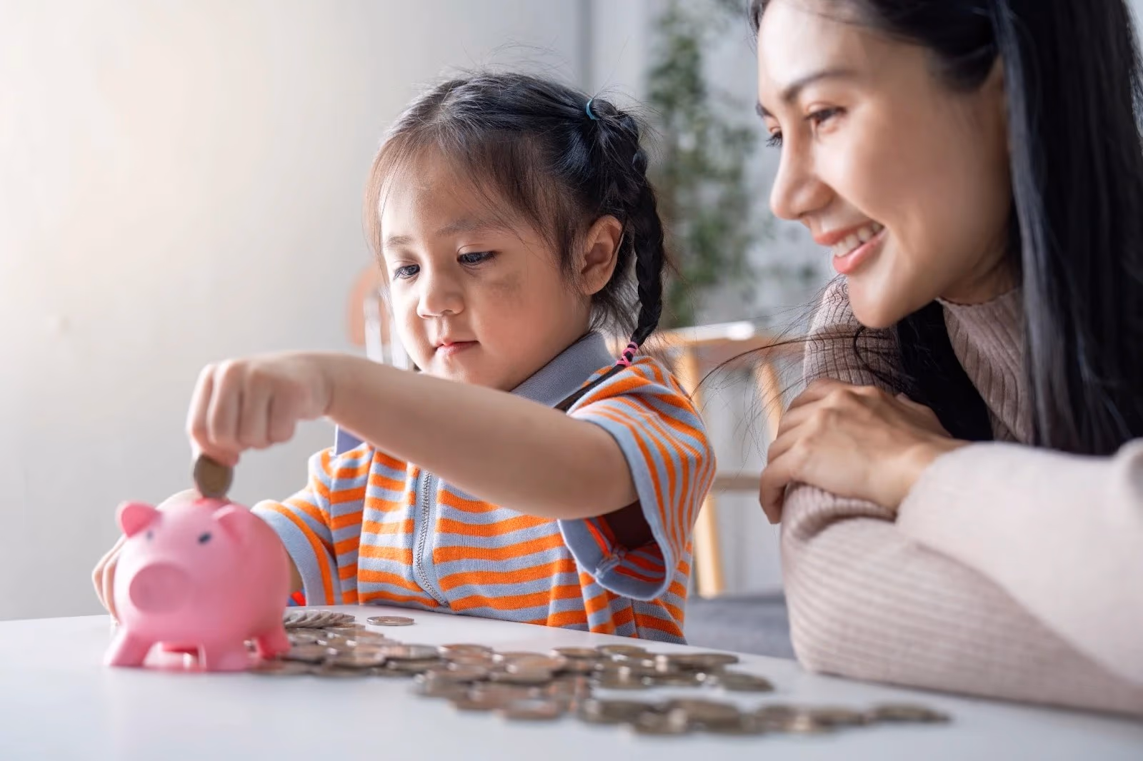 Parent adjusting monthly education contributions after a job change or raise